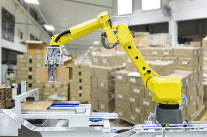 Robotic palletizer arm stacking boxes