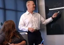 Presenter walking partners through a financing plan