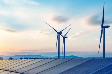 Hybrid power system combines power from solar panels and wind turbines.