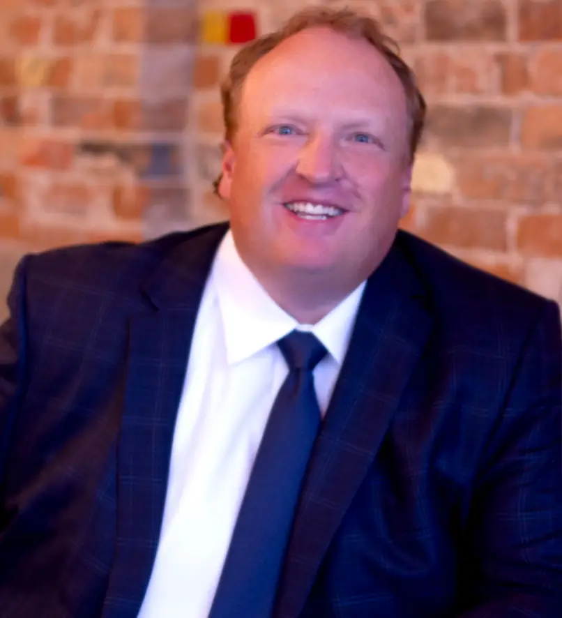 Headshot of Travis Colledge