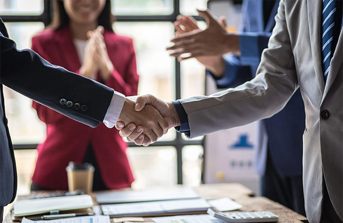 Equipment vendor reviewing financing options with a customer