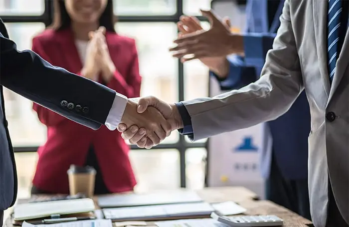 Equipment vendor reviewing financing options with a customer